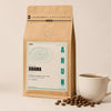 Sidama Natural – bag next to a cup of coffee