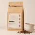 Yirgacheffe – bag next to a cup of coffee